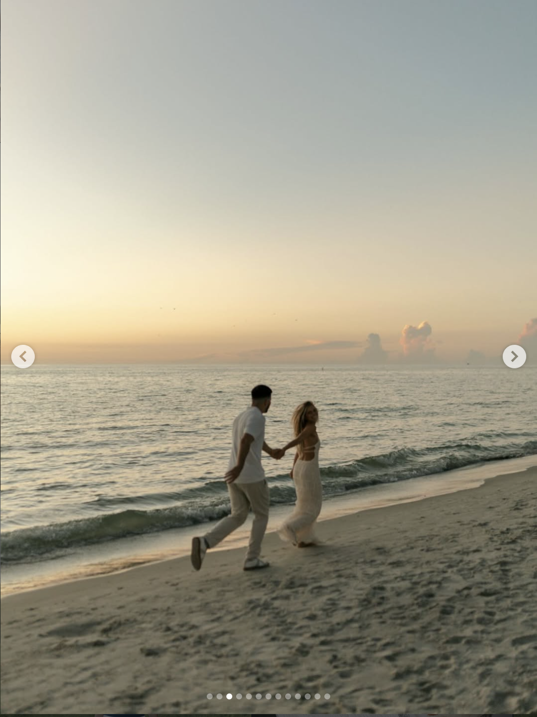 Couple on beach at sunset